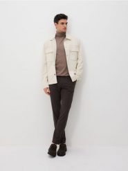 Spodnie chino slim fit - ciemnobrązowy. Brązowe spodnie materiałowe męskie Reserved, bez wzorów, z bawełny. Za 149.99 zł.