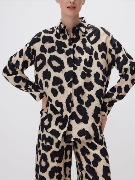 Wzorzysta koszula z wiskozy - brązowy. Brązowe koszule damskie Reserved, l, bez wzorów, z tkaniny, bez kołnierzyka, bez ramiączek. W wyprzedaży za 59.99 zł.