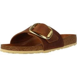 Klapki damskie Birkenstock Madrid Big Buckle Cognac Natural Leather. Brązowe klapki damskie Birkenstock, bez wzorów, z materiału, bez obcasa. Za 799.00 zł.