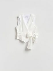 Kamizelka z wiązaniem - biały. Białe kamizelki damskie Reserved, l, z lyocellu. Za 149.99 zł.