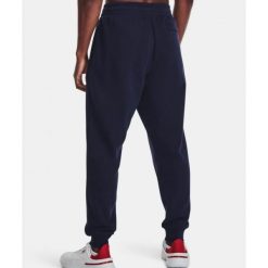 Spodnie Męskie Under Armour Dresowe Joggery Sportowe Rivalfleece Joggers Xs. Niebieskie spodnie dresowe męskie Under Armour, bez wzorów, z dresówki. Za 299.99 zł.