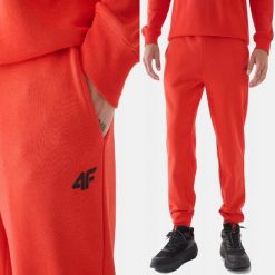 SPODNIE DRESOWE MĘSKIE 4F JOGGERY DRESY SPORTOWE POMARAŃCZOWE. Brązowe spodnie sportowe męskie 4f, z bawełny. Za 149.99 zł.
