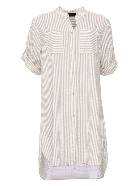 Zwillingsherz Tunika w kolorze beżowym rozmiar: onesize. Brązowe tuniki damskie Zwillingsherz, bez wzorów, z bawełny, bez kołnierzyka, bez ramiączek. Za 170.03 zł.