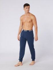 DKNY Spodnie dresowe w kolorze granatowym rozmiar: S. Niebieskie spodnie dresowe męskie DKNY, bez wzorów, z bawełny. Za 83.62 zł.