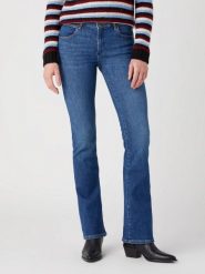 DAMSKIE SPODNIE WRANGLER BOOTCUT RITA 112342859. Spodnie materiałowe damskie Wrangler, bez wzorów, z jeansu. Za 219.99 zł.