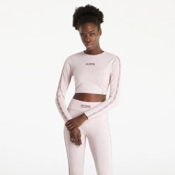 KOSZULKA DAMSKA Z DŁUGIM RĘKAWEM BLUZKA CROP ELLESSE. Czerwone bluzki sportowe damskie Ellesse, uniwersalny, bez wzorów, z materiału, bez ramiączek. Za 116.99 zł.