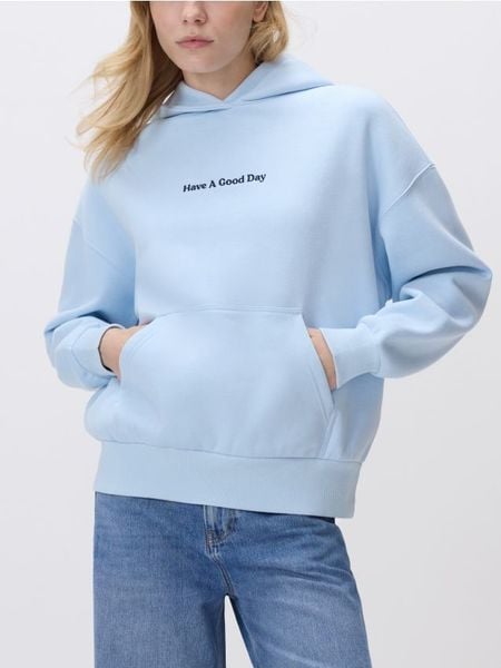 Bluza z napisem - jasnoniebieski. Niebieskie bluzy bez kaptura damskie Reserved, l, z bawełny. Za 129.99 zł.
