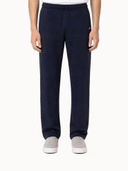 Spodnie Le Coq Sportif SMU Tri. Niebieskie spodnie materiałowe męskie Le Coq Sportif, bez wzorów, z materiału, sportowe. Za 472.00 zł.