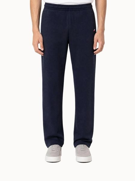 Spodnie Le Coq Sportif SMU Tri. Niebieskie spodnie materiałowe męskie Le Coq Sportif, bez wzorów, z materiału, sportowe. Za 472.00 zł.