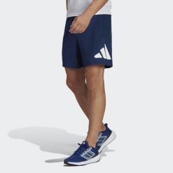 Szorty treningowe męskie adidas Train Essentials. Białe szorty męskie Adidas, bez kołnierzyka. Za 159.00 zł.