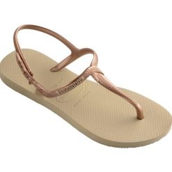 Klapki Havaianas Model 4144756 Kolor Brąz. Brązowe klapki damskie Havaianas, bez wzorów, z gumy, bez obcasa. Za 69.99 zł.