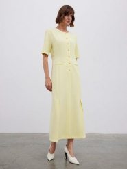 BGN Sukienka w kolorze żółtym rozmiar: 40. Żółte sukienki damskie BGN, na imprezę, bez wzorów, bez kołnierzyka, bez ramiączek, maxi. Za 176.08 zł.