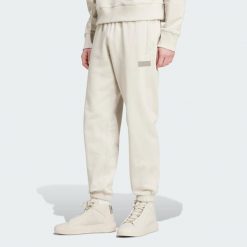 Spodnie Dresowe Mercedes - Amg Petronas Formula One Team Premium. Brązowe spodnie dresowe męskie Adidas, z dresówki. Za 399.00 zł.
