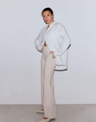 Damskie spodnie z mieszanki modalu, wysoki stan, szerokie nogawki Luxe piaskowe. Brązowe spodnie sportowe damskie Aim'n, s, z elastanu, na fitness i siłownię. Za 517.00 zł.