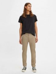 Levi's Spodnie chino w kolorze beżowym rozmiar: W31/L32. Brązowe spodnie materiałowe męskie Levi's, bez wzorów. Za 165.99 zł.
