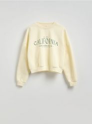 Bluza oversize z nadrukiem - kremowy. Białe bluzy bez kaptura damskie Reserved, l, z bawełny. W wyprzedaży za 49.99 zł.