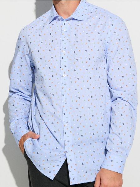 Koszula ze wzorem świątecznym - błękitny. Niebieskie koszule męskie Sinsay, l, bez wzorów, bez kołnierzyka, bez ramiączek. W wyprzedaży za 24.99 zł.