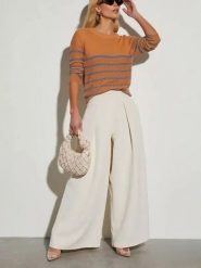 LA Angels Spodnie w kolorze białym rozmiar: M. Białe spodnie materiałowe damskie LA Angels, bez wzorów, z materiału. Za 189.29 zł.