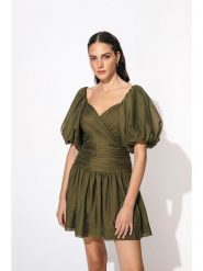 By Malina Sukienka "Nola" w kolorze khaki rozmiar: L. Brązowe sukienki damskie BY MALINA, l, bez wzorów, bez kołnierzyka, bez ramiączek, mini, rozkloszowane. Za 368.09 zł.