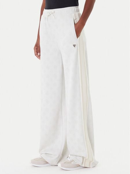 Guess Spodnie dresowe V5YB10 K0282 Écru Relaxed Fit. Spodnie dresowe damskie Guess, l, z aplikacjami, z dresówki. Za 269.99 zł.