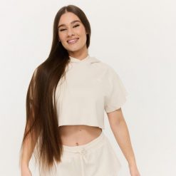 Bluza damska fitness z kapturem krótka Relay Cropped Pearl. Białe bluzy sportowe damskie GYMBEAM, l, z bawełny. Za 125.90 zł.