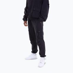 Spodnie męskie BOXRAW Benton Cargo Bottoms. Czarne spodnie materiałowe męskie BOXRAW, bez wzorów, z materiału. Za 399.99 zł.