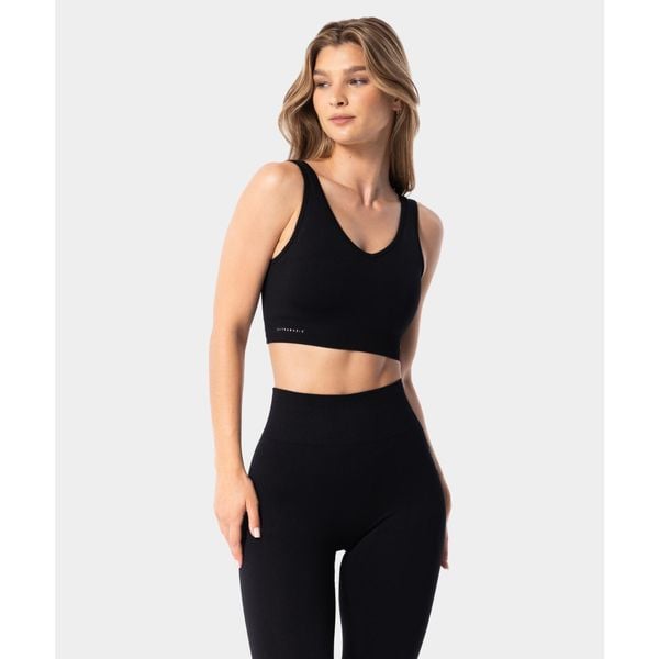 Biustonosz sportowy bezszwowy damski Simply Seamless Carpatree. Czarne biustonosze sportowe damskie Carpatree, bez wzorów. Za 69.99 zł.