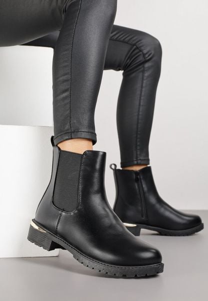 Czarne Botki w Stylu Sztybletów z Imitacji Skóry z Elastyczną Wstawką Kanelle. Czarne botki damskie Born2be, ze skóry, biznesowe, bez obcasa, na płaskiej podeszwie, bez zapięcia. Za 84.99 zł.