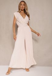 Beżowy Kopertowy Kombinezon Wide Leg Zdobiony Plisami i Paskiem z Klamrą Salirella. Brązowe kombinezony damskie Renee, l, z aplikacjami, eleganckie, bez kołnierzyka, bez ramiączek. Za 84.99 zł.