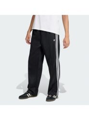 Adidas Spodnie dresowe adicolor KE3501 Czarny Loose Fit. Czarne spodnie dresowe męskie Adidas, bez wzorów, z bawełny. Za 279.99 zł.