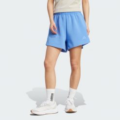 Luźne szorty Soft Lux. Brązowe spodenki sportowe damskie Adidas, bez wzorów, sportowe. Za 219.00 zł.