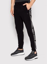 Guess Spodnie dresowe Z2YB19 K6ZS1 Czarny Regular Fit. Czarne spodnie dresowe męskie Guess, z aplikacjami, z bawełny. Za 299.99 zł.