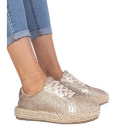 Złote damskie espadryle zdobione brokatem złoty. Żółte espadryle damskie z aplikacjami, z tkaniny, bez obcasa, na platformie. Za 73.74 zł.