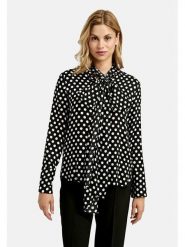 Milano Italy Bluzka w kolorze czarnym rozmiar: 34. Czarne bluzki damskie Milano Italy, bez wzorów, z wiskozy, bez kołnierzyka, bez ramiączek. Za 173.99 zł.