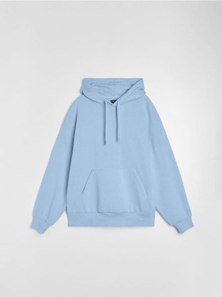Bluza z kapturem comfort fit z domieszką bawełny - niebieski. Niebieskie bluzy z kapturem męskie Sinsay, l, z bawełny. Za 39.99 zł.