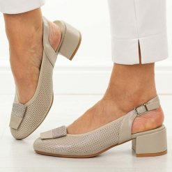 Złote sandały damskie na obcasie Potocki 12817. Żółte sandały damskie POTOCKI, z aplikacjami, ze skóry, bez obcasa, na obcasie. Za 179.00 zł.