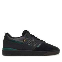 Tenisówki New Balance. Czarne trampki i tenisówki męskie New Balance, bez wzorów, bez zapięcia. Za 449.99 zł.