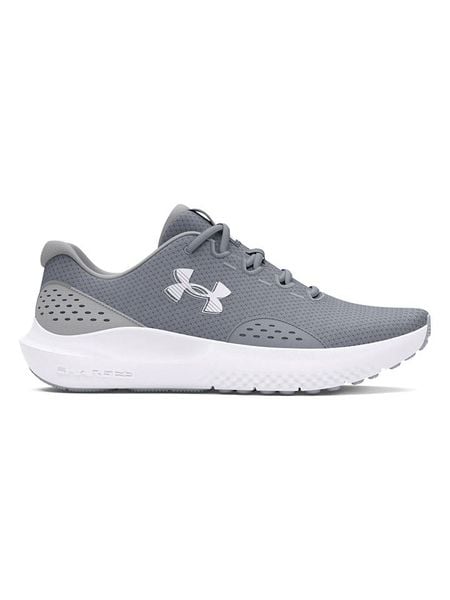 Under Armour Buty "Charged Surge 4" w kolorze szarym do biegania rozmiar: 44. Szare obuwie do biegania damskie Under Armour. Za 169.95 zł.