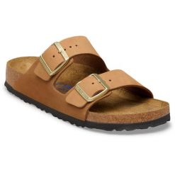 Klapki Birkenstock Arizona Sfb Z Nubukowej Skóry Damskie. Brązowe klapki damskie Birkenstock, bez wzorów, z materiału, bez obcasa. Za 650.90 zł.