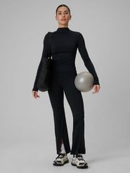 4F Spodnie treningowe z rozszerzanymi nogawkami damskie - czarne L. Czarne spodnie materiałowe damskie 4f, bez wzorów, ze skóry, z podwyższonym stanem. Za 169.99 zł.