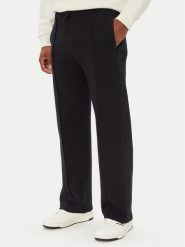 Guess Spodnie dresowe Z6YB14 K4966 Czarny Regular Fit. Czarne spodnie dresowe męskie Guess, z aplikacjami, z bawełny. Za 394.99 zł.