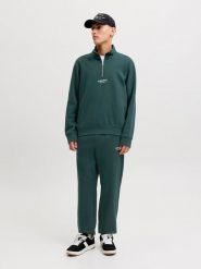 Jack & Jones Spodnie dresowe "Jpdtkane" w kolorze ciemnozielonym rozmiar: S. Zielone spodnie dresowe męskie Jack & Jones, bez wzorów, z bawełny. Za 119.95 zł.