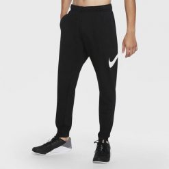 Spodnie treningowe damskie Nike Taper. Czarne spodnie sportowe damskie Nike, xl, na fitness i siłownię. Za 492.00 zł.