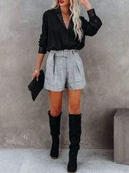 Milan Kiss Bluzka w kolorze czarnym rozmiar: L. Czarne bluzki damskie Milan Kiss, l, bez wzorów, bez kołnierzyka, bez ramiączek. Za 152.99 zł.