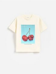 T-shirt z nadukiem - kremowy. Białe koszulki dziewczęce Reserved, bez wzorów, z bawełny, bez ramiączek. Za 39.99 zł.