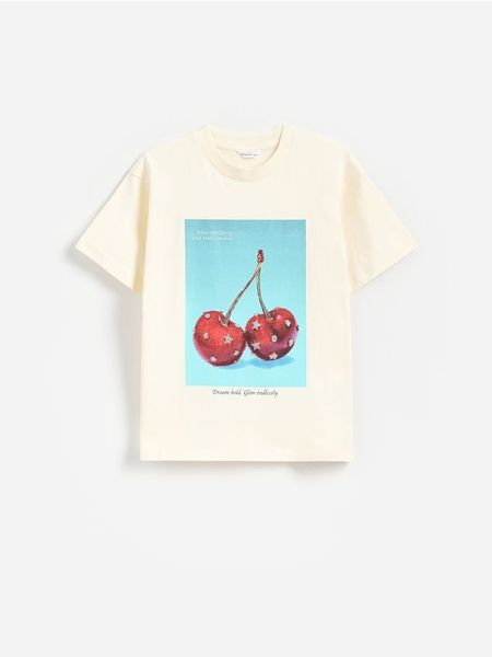 T-shirt z nadukiem - kremowy. Białe koszulki dziewczęce Reserved, bez wzorów, z bawełny, bez ramiączek. Za 39.99 zł.