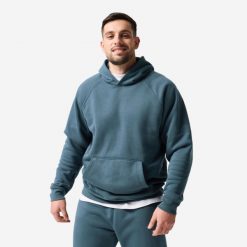 Bluza sportowa z kapturem męska Domyos. Niebieskie bluzy sportowe męskie DOMYOS, bez wzorów, z bawełny, sportowe, bez kołnierzyka, bez ramiączek. Za 179.99 zł.