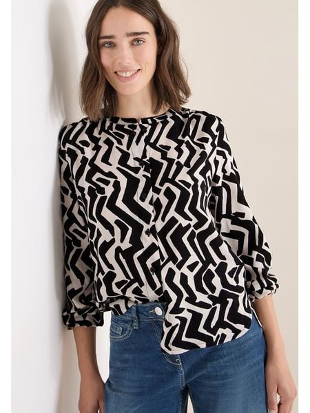 Cecil Bluzka w kolorze czarno-białym rozmiar: L. Białe bluzki damskie Cecil, l, bez wzorów, z wiskozy, bez kołnierzyka, bez ramiączek. Za 100.99 zł.