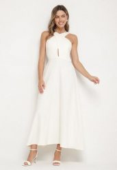 Żółta Rozkloszowana Sukienka z Wiskozą i Dekoltem Typu Halter Dolienna. Żółte sukienki damskie Born2be, l, bez wzorów, z wiskozy, eleganckie, bez kołnierzyka, bez ramiączek, maxi, rozkloszowane. Za 89.99 zł.