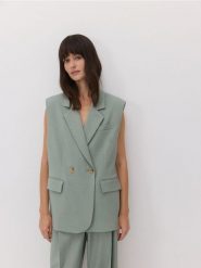 Dwurzędowa kamizelka - jasnozielony. Zielone kamizelki damskie Reserved, l, z tkaniny. W wyprzedaży za 99.99 zł.